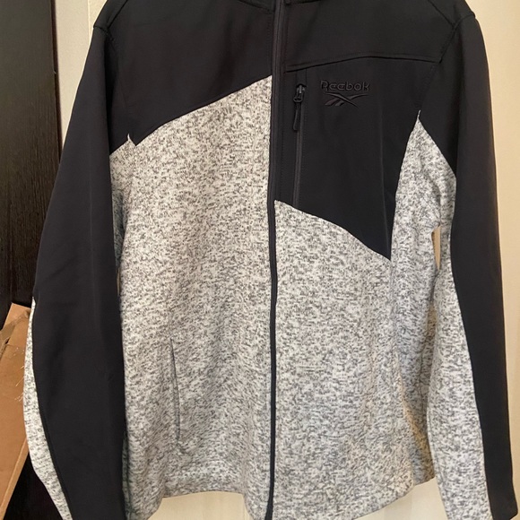 Black and grey full zip Reebok hoodie. - Picture 3 of 5